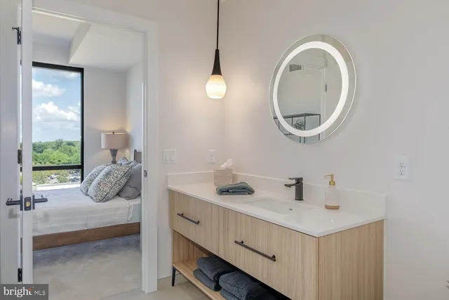 a bathroom with a sink and a mirror