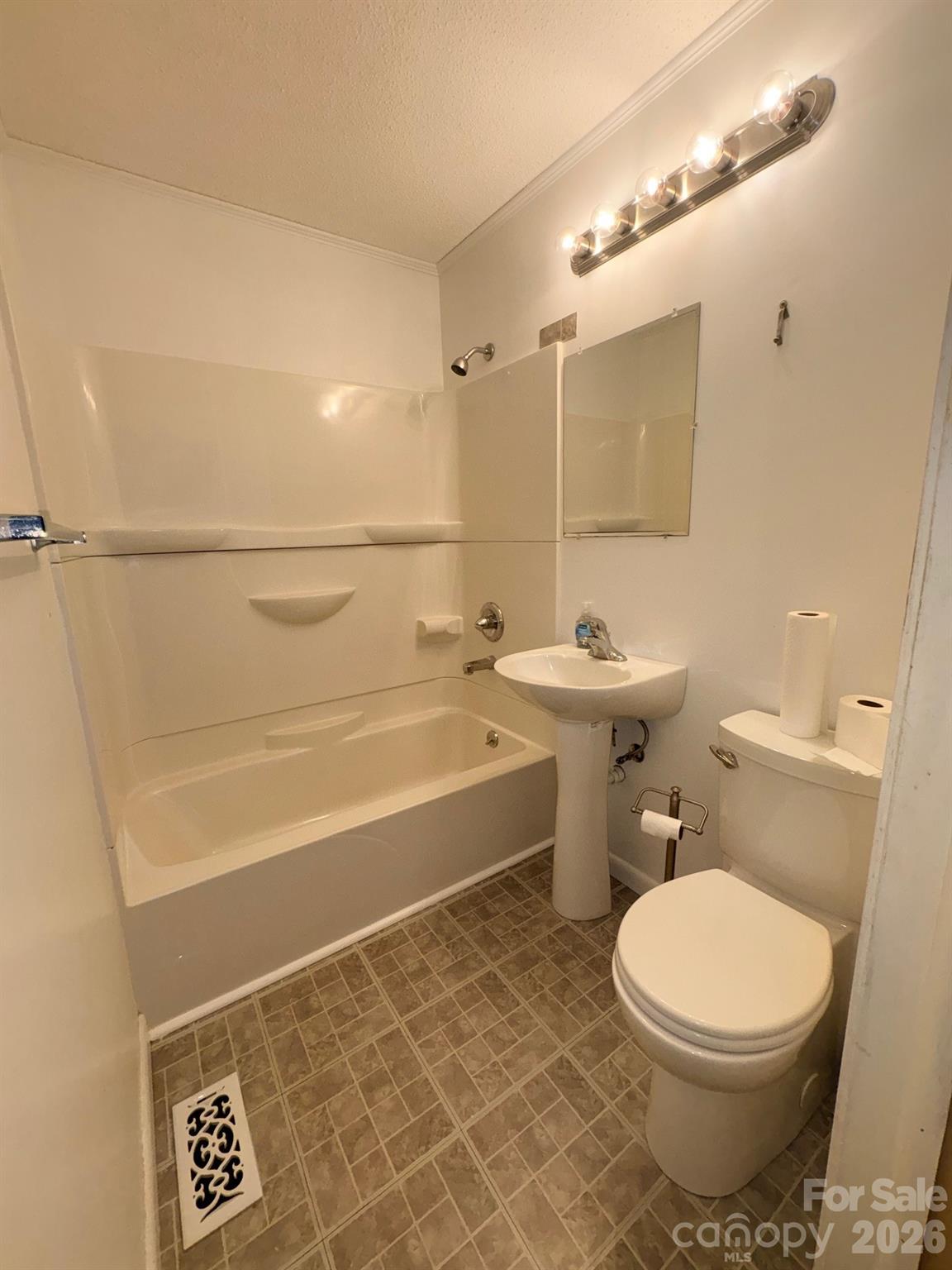 3955 Tower Road Maiden, NC 28650 - Photo 18 of 45 a bathroom with a sink a toilet and a mirror