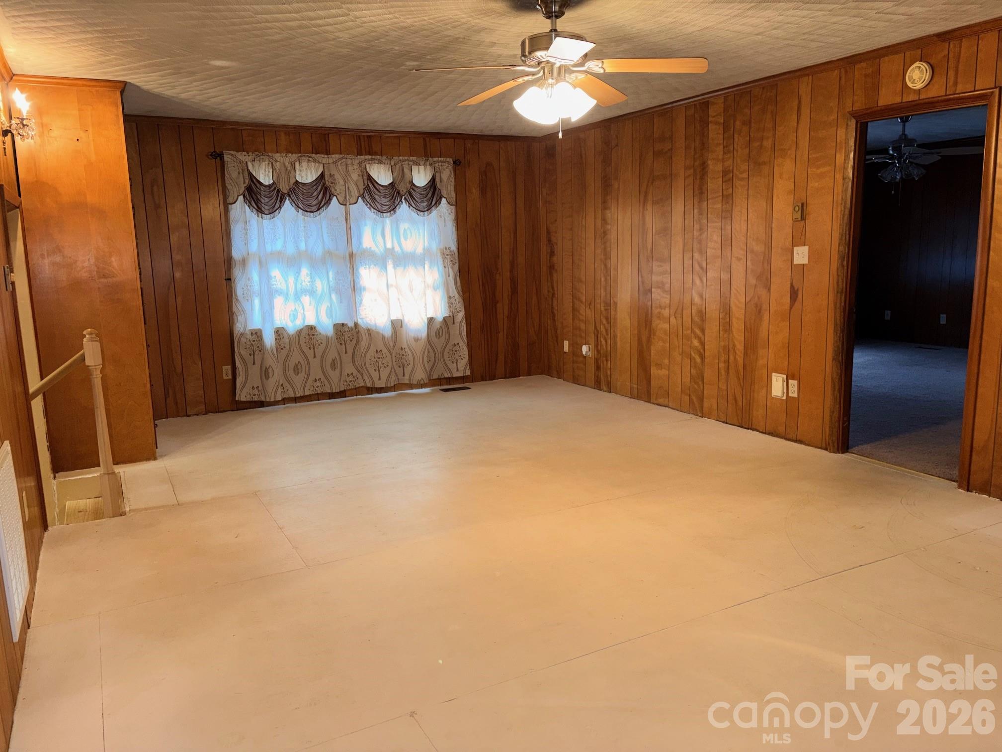 3955 Tower Road Maiden, NC 28650 - Photo 23 of 45 en empty room with windows and fan