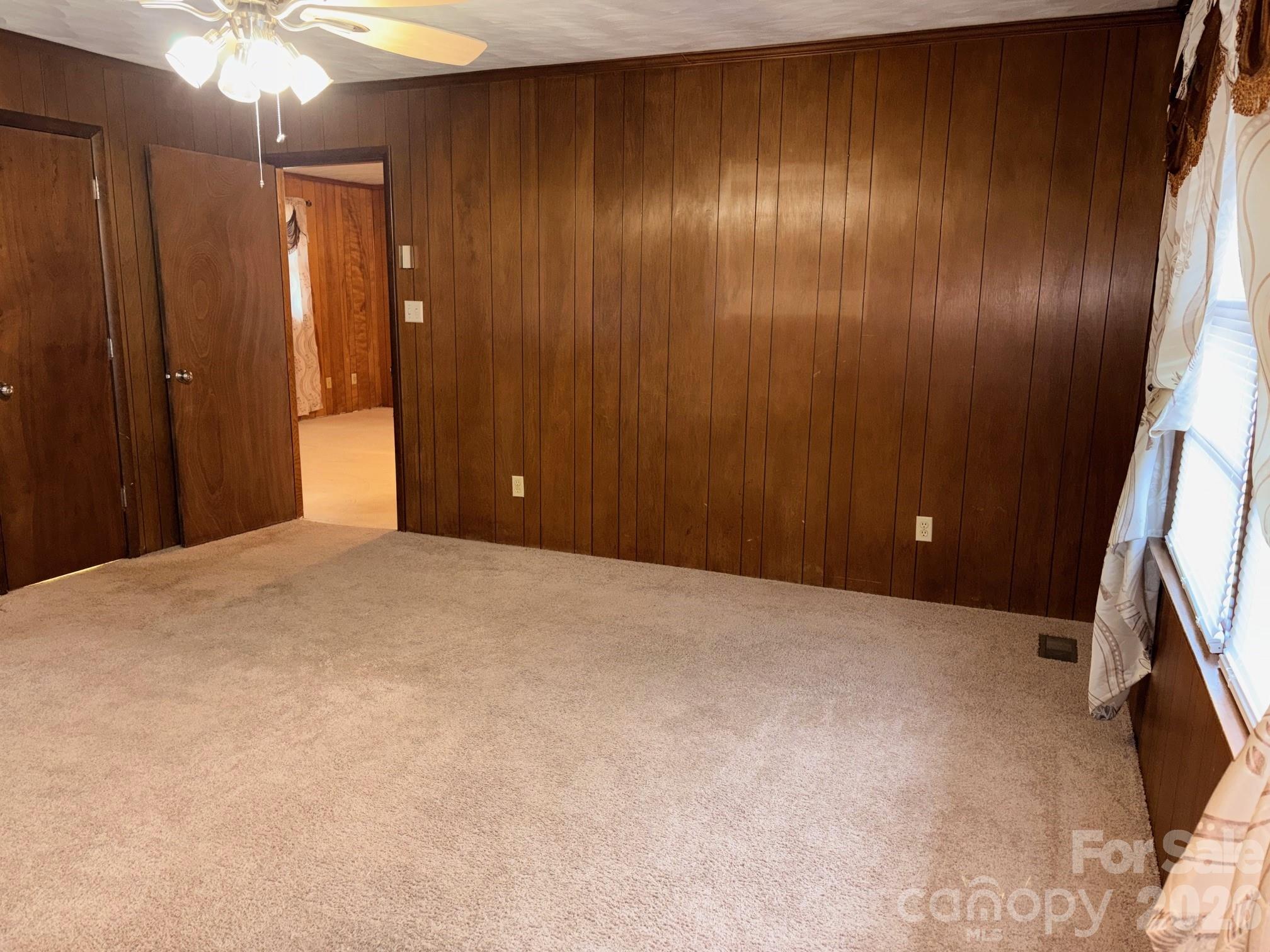 3955 Tower Road Maiden, NC 28650 - Photo 31 of 45 a view of an empty room with wooden floor