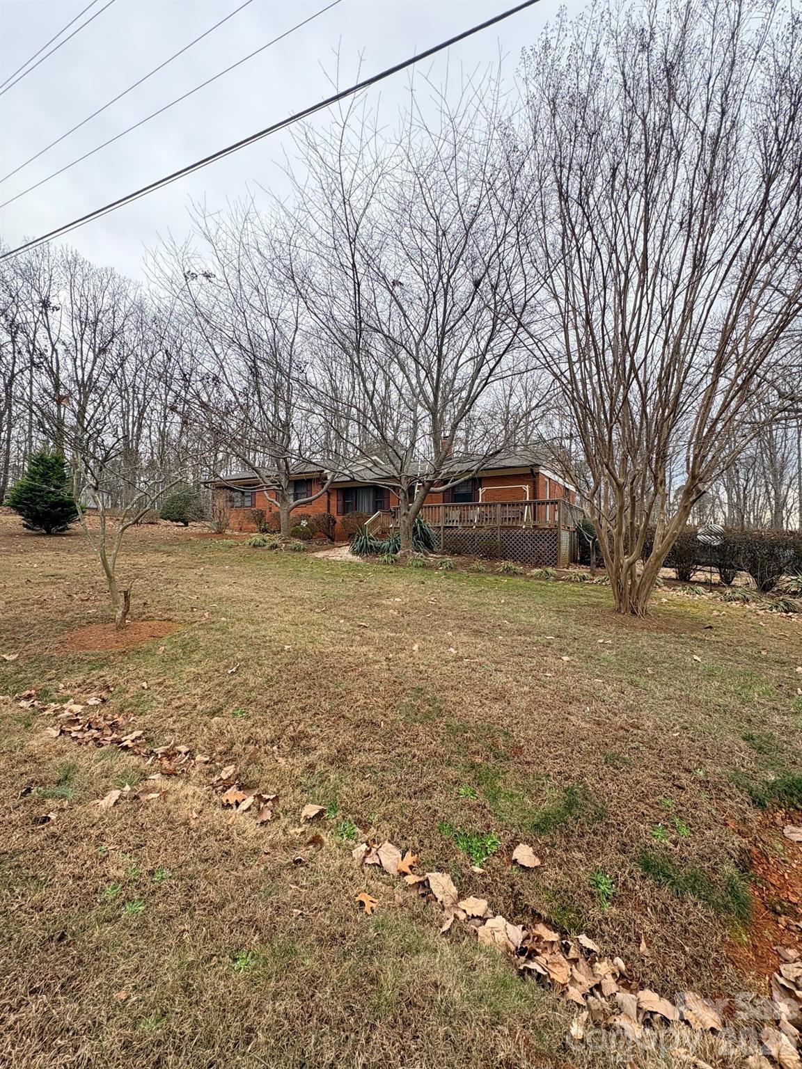 3955 Tower Road Maiden, NC 28650 - Photo 4 of 45 a view of a yard with a house