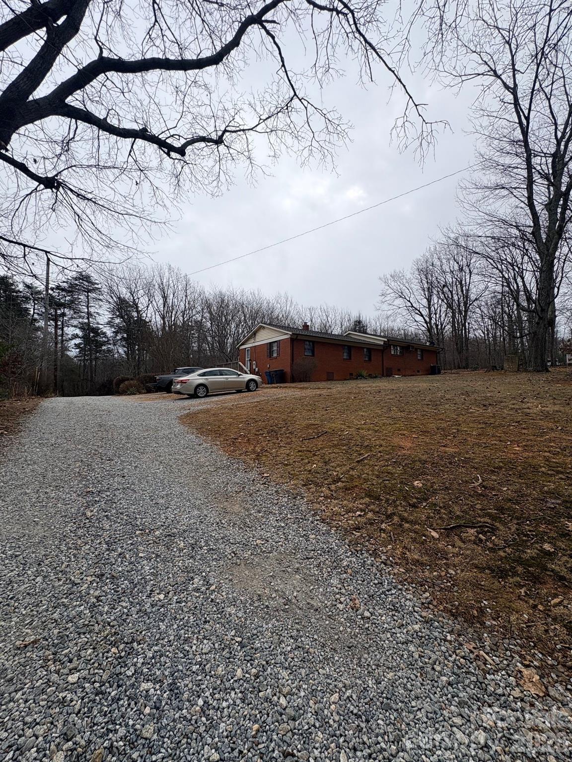 3955 Tower Road Maiden, NC 28650 - Photo 41 of 45 a view of a field with an trees