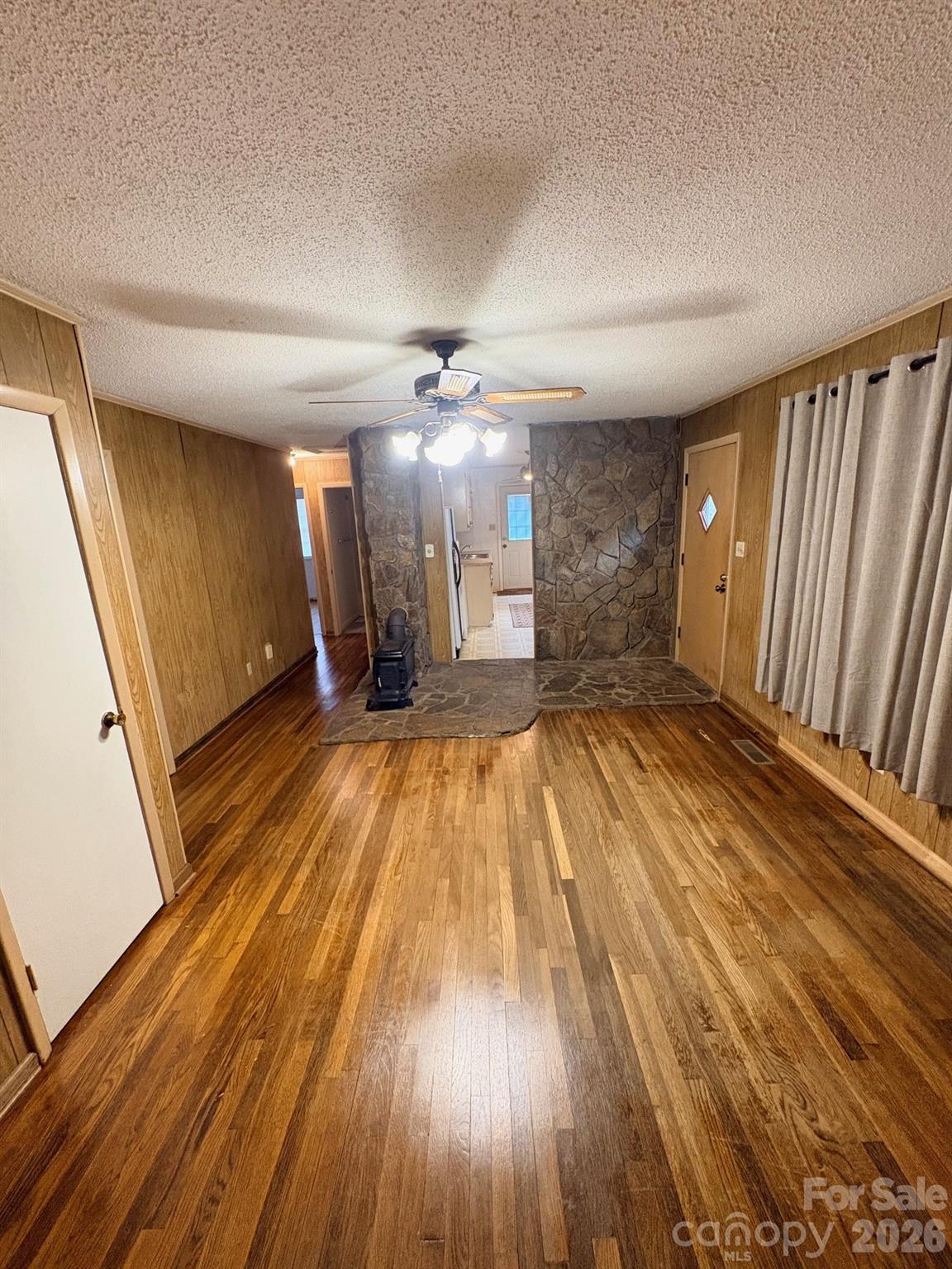 3955 Tower Road Maiden, NC 28650 - Photo 6 of 45 a view of a room with wooden floor and staircase