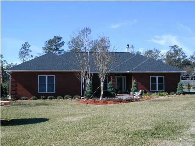 2583 Valley Road Navarre, FL 32566 - Photo 1 of 12 Front as seen from the golf course.