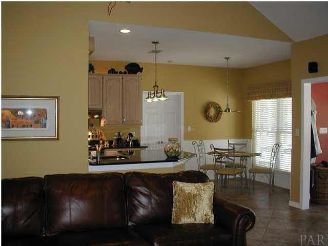 2583 Valley Road Navarre, FL 32566 - Photo 4 of 12 Breakfast bar with eating area in the background
