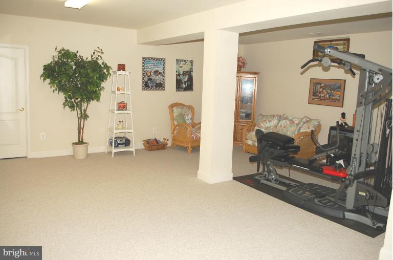 22 Riders Court Edgewater, MD 21037 - Photo 29 of 30 Lower Level Area for Pool/Ping Pong Table/Gym