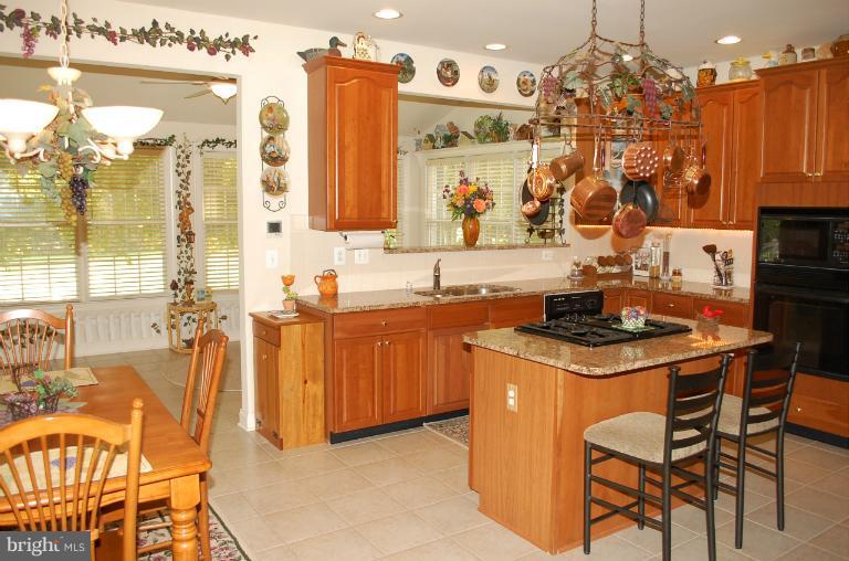 22 Riders Court Edgewater, MD 21037 - Photo 10 of 30 Kitchen looking into Sunroom