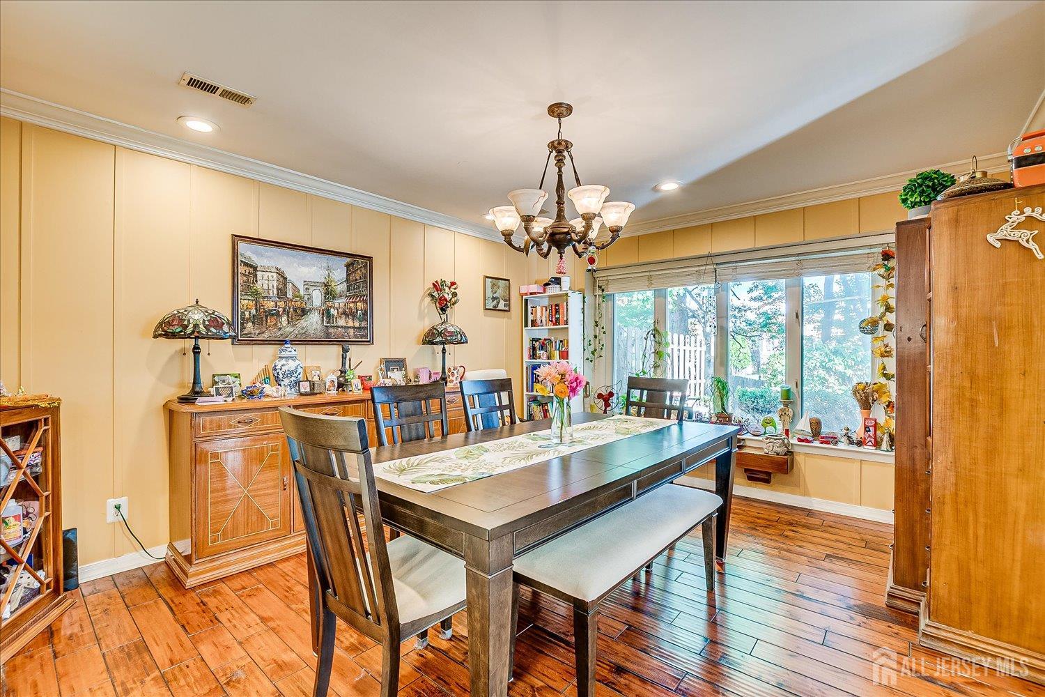 118 Coppertree Court Edison, NJ 08820 - Photo 24 of 58 a view of a dining room with furniture window and wooden floor