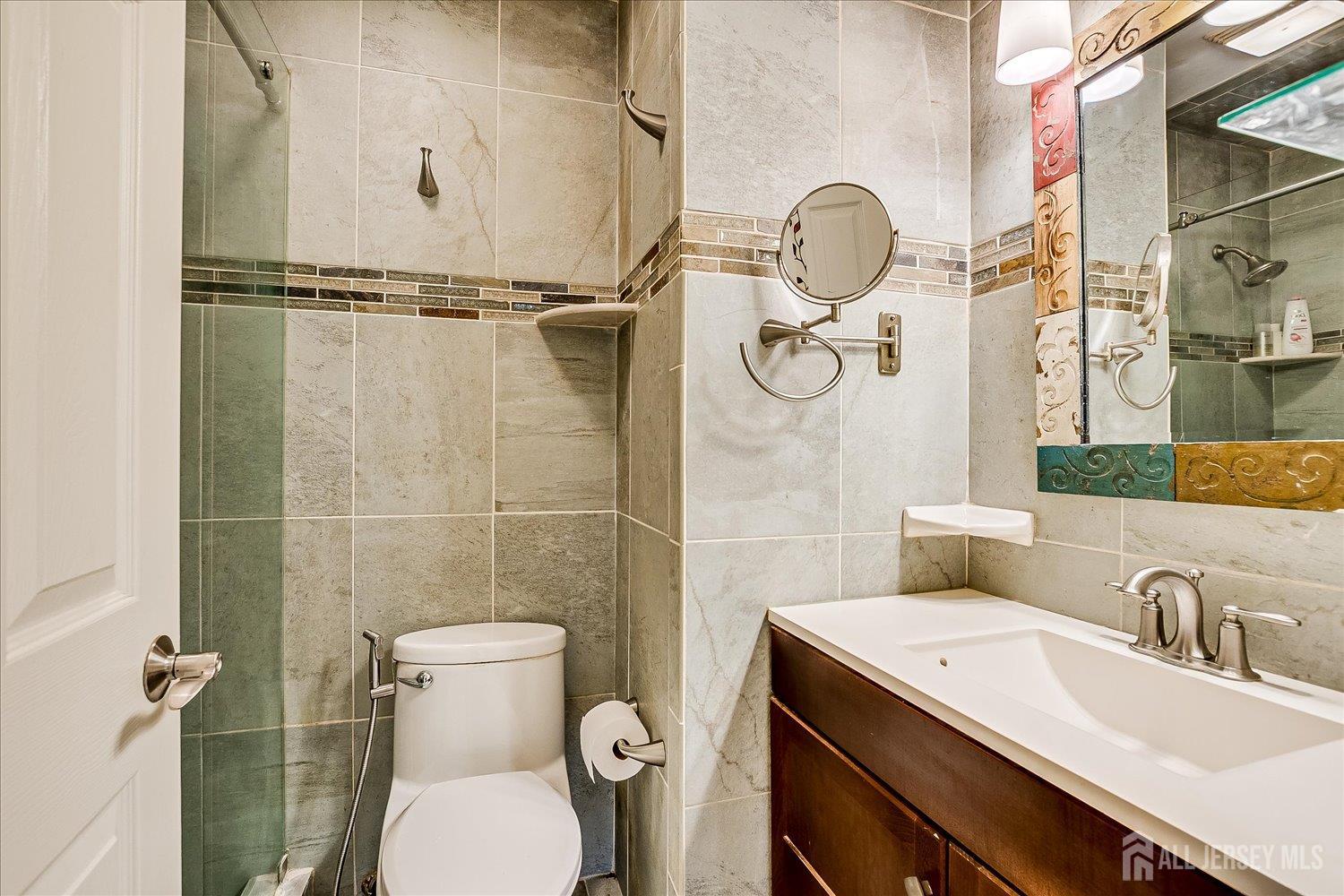 118 Coppertree Court Edison, NJ 08820 - Photo 37 of 58 a bathroom with a sink toilet and shower