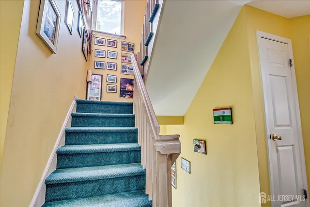 a view of a house with a small yard