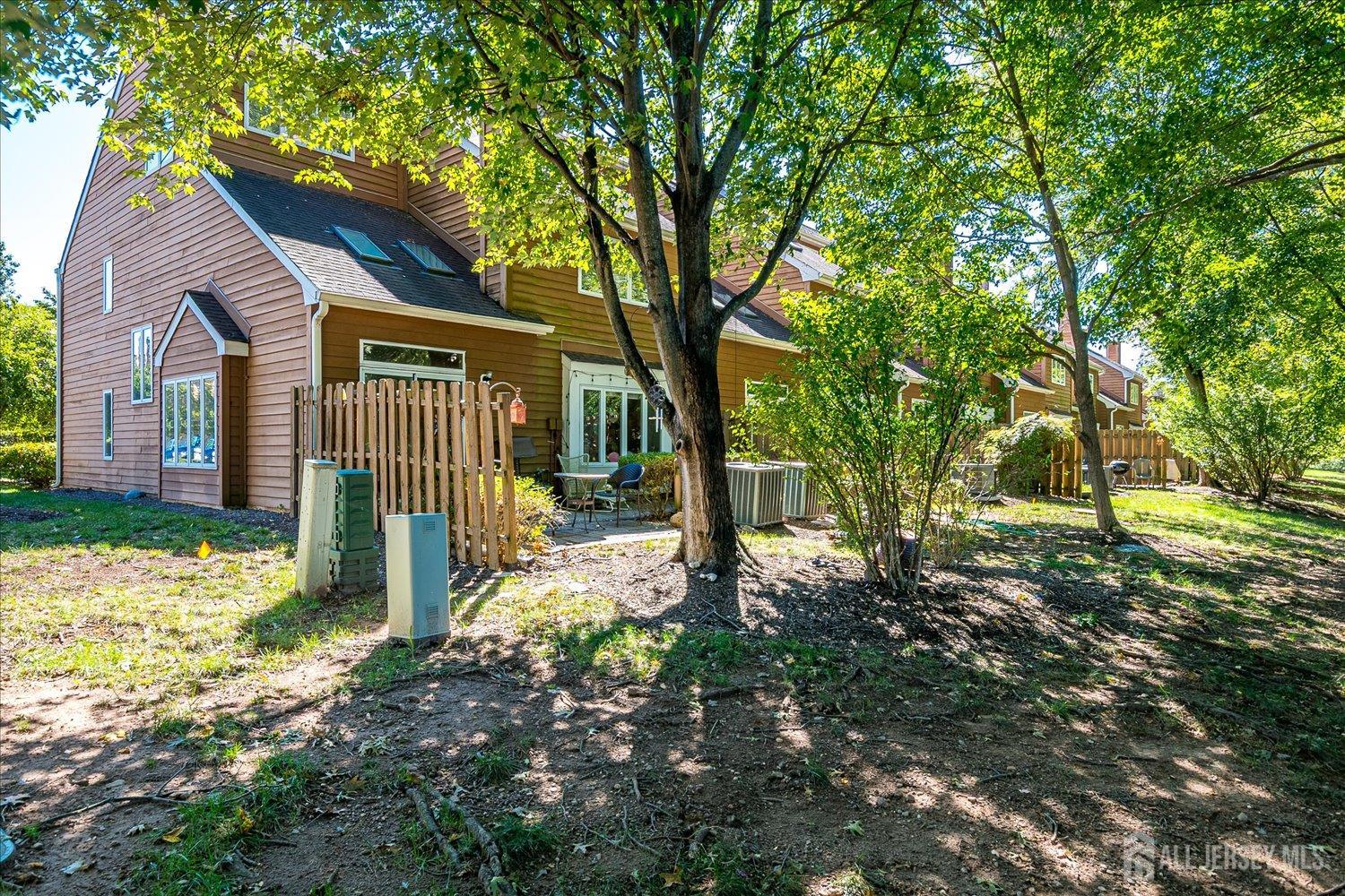 118 Coppertree Court Edison, NJ 08820 - Photo 42 of 58 a view of a house with a small yard