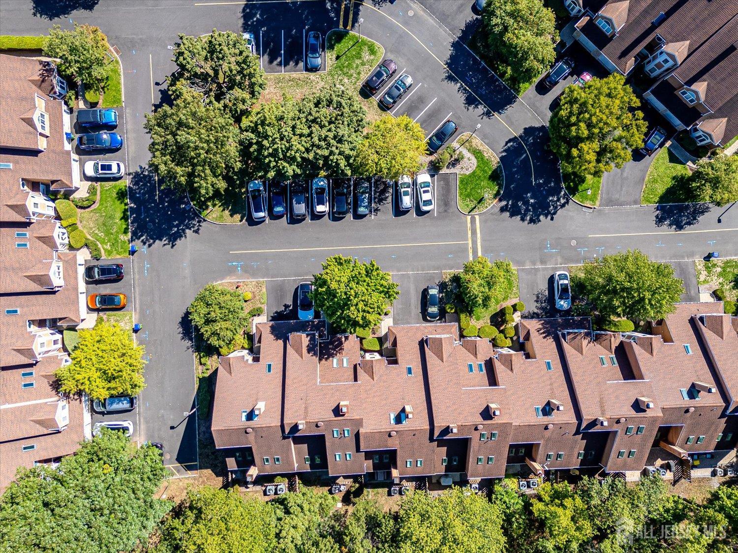 118 Coppertree Court Edison, NJ 08820 - Photo 49 of 58 an aerial view of a house with a yard and large trees