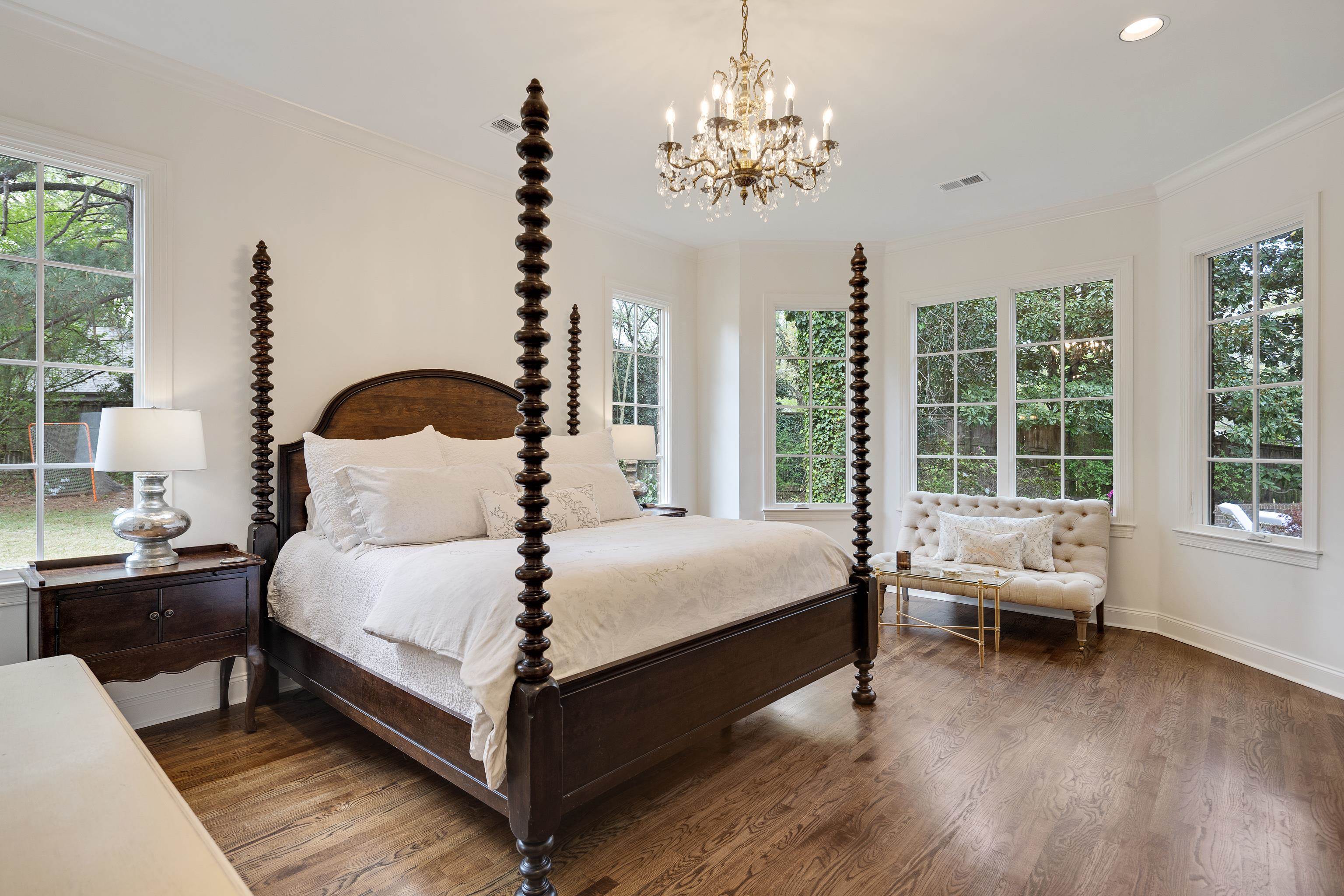 101 North Grove Park Road Memphis, TN 38117 - Photo 16 of 40 Bedroom featuring suspended lighting, dark wood finished floors, crown molding, and multiple windows