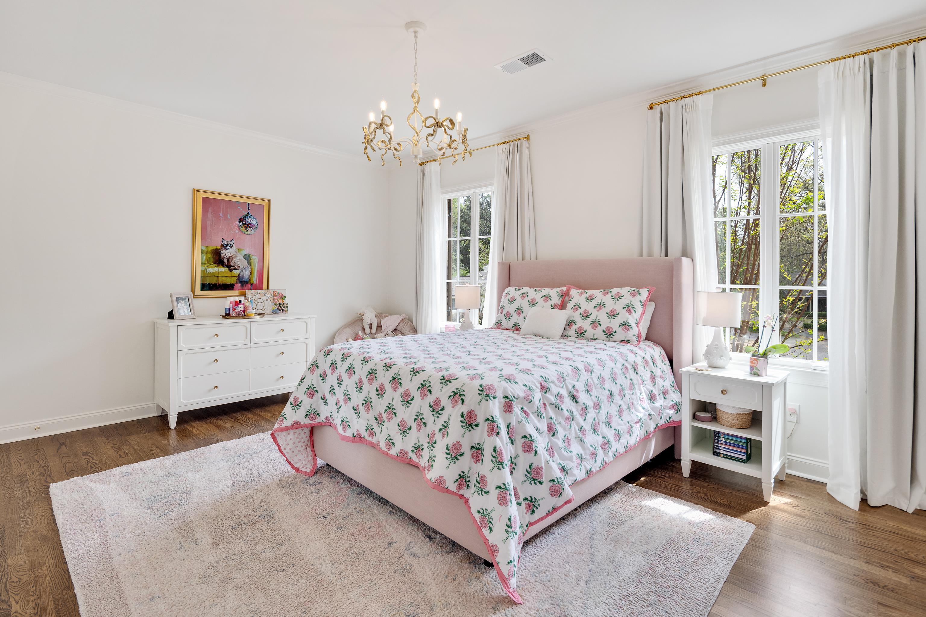 101 North Grove Park Road Memphis, TN 38117 - Photo 20 of 40 Bedroom featuring dark wood-style floors, suspended lighting, and ornamental molding