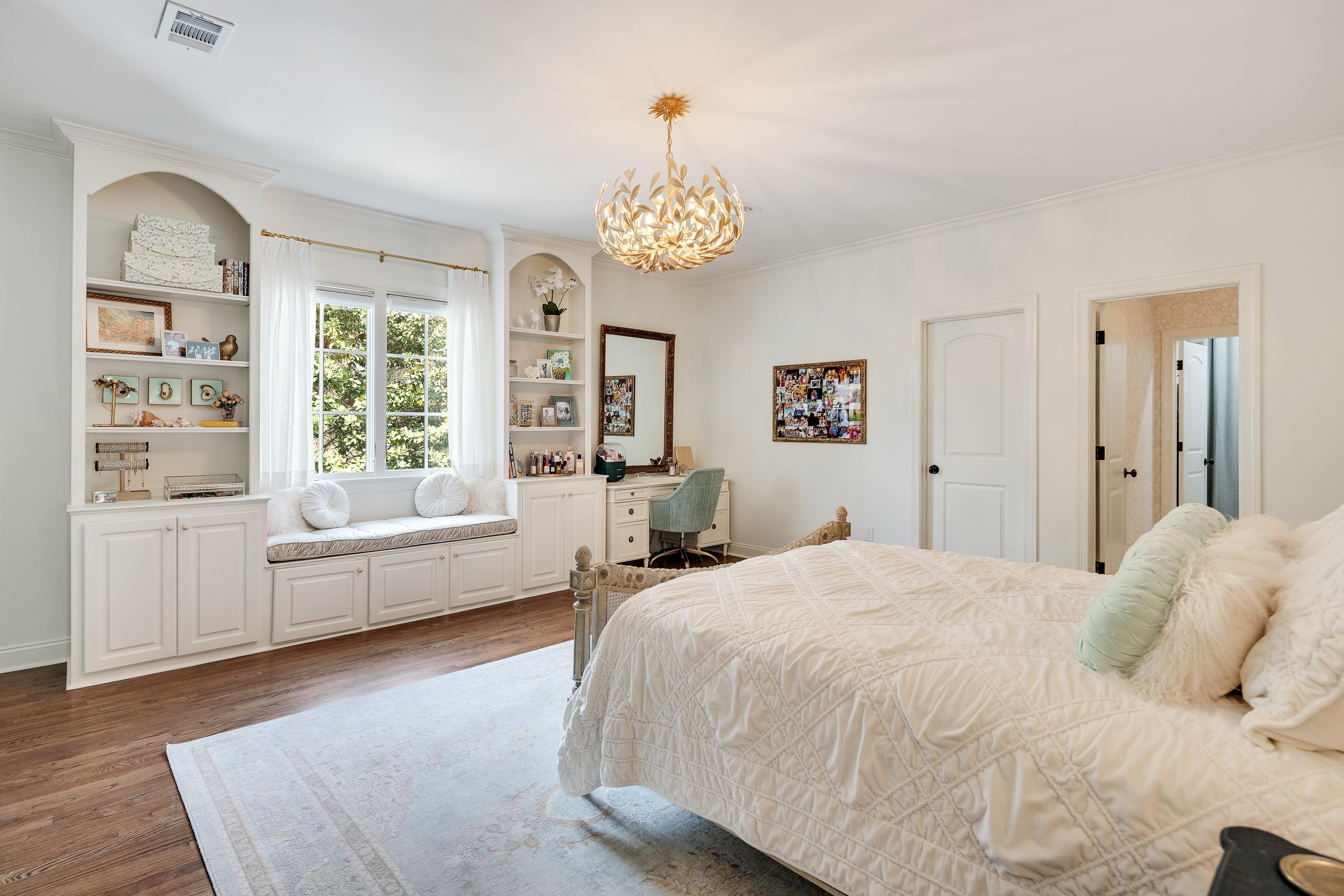 101 North Grove Park Road Memphis, TN 38117 - Photo 21 of 40 Bedroom featuring crown molding, wood finished floors, suspended lighting, and an office area