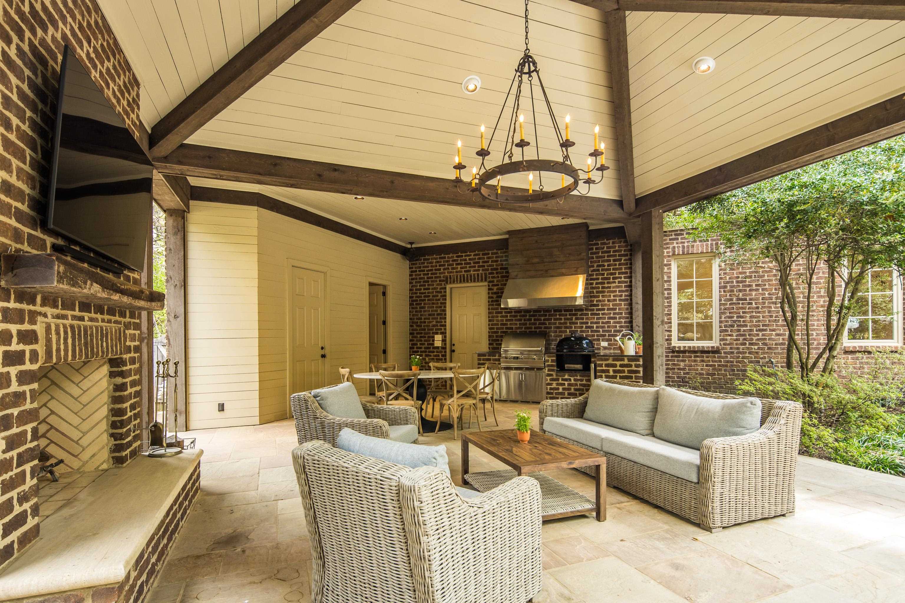 101 North Grove Park Road Memphis, TN 38117 - Photo 30 of 40 View of patio / terrace with an outdoor kitchen / dining area and an outdoor brick fireplace