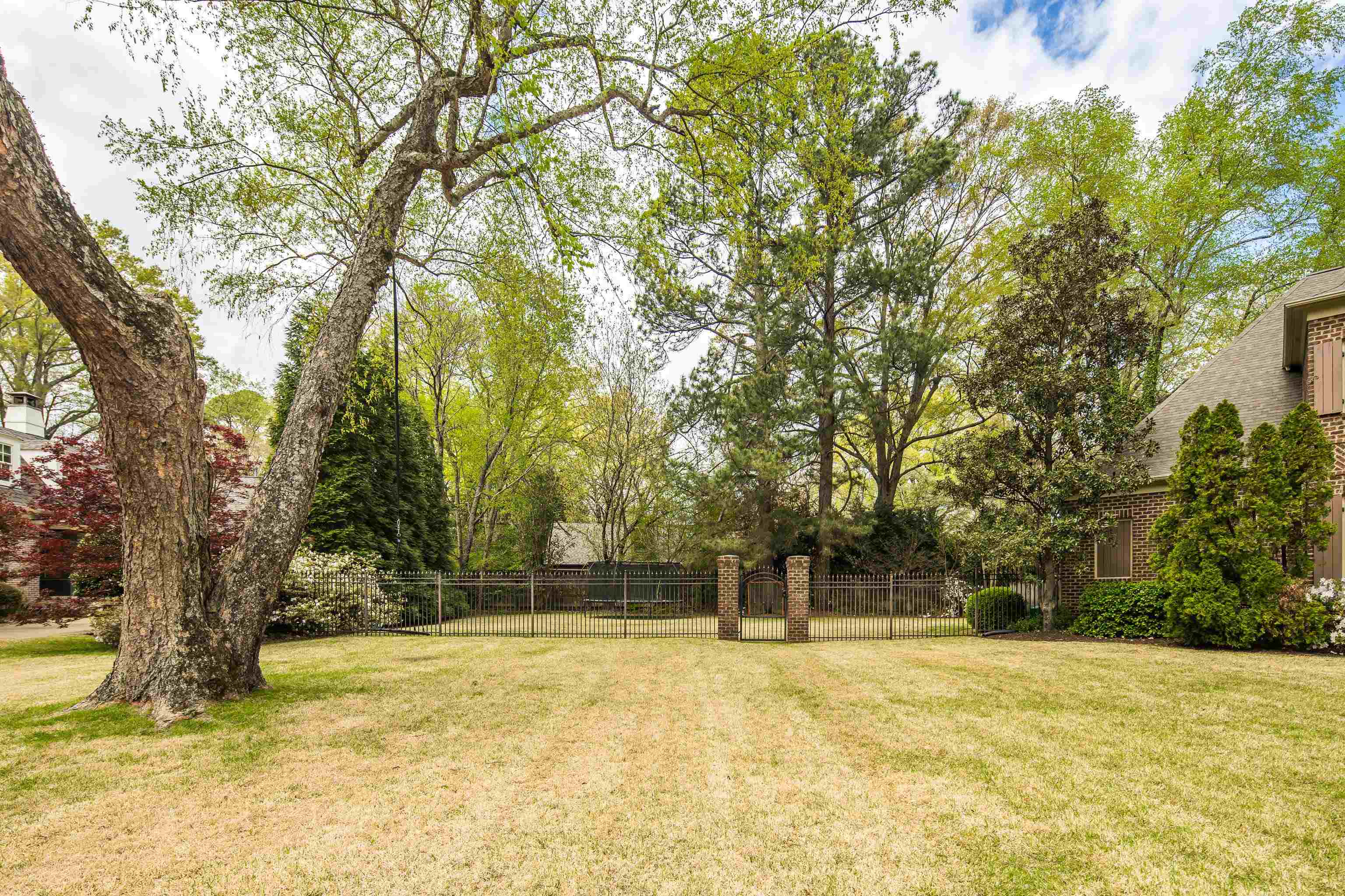 101 North Grove Park Road Memphis, TN 38117 - Photo 38 of 40 View of yard featuring a gate