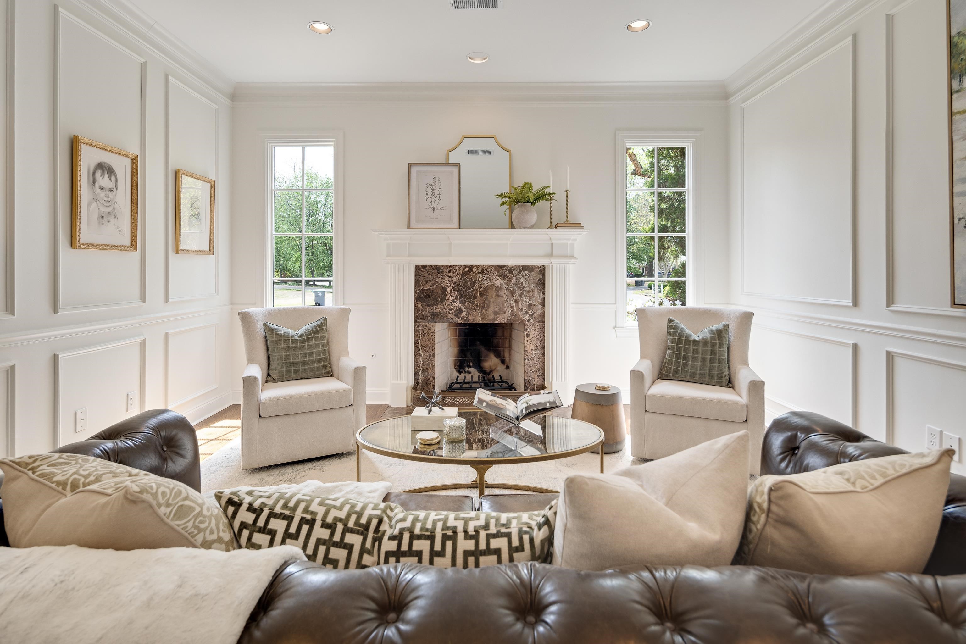 101 North Grove Park Road Memphis, TN 38117 - Photo 6 of 40 Living room featuring a decorative wall, crown molding, a high end fireplace, plenty of natural light, and recessed lighting