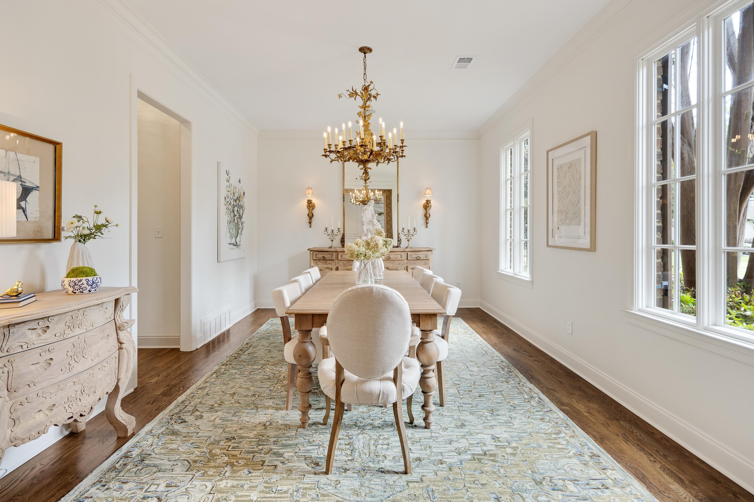 101 North Grove Park Road Memphis, TN 38117 - Photo 8 of 40 Dining area with suspended lighting, ornamental molding, and dark wood finished floors