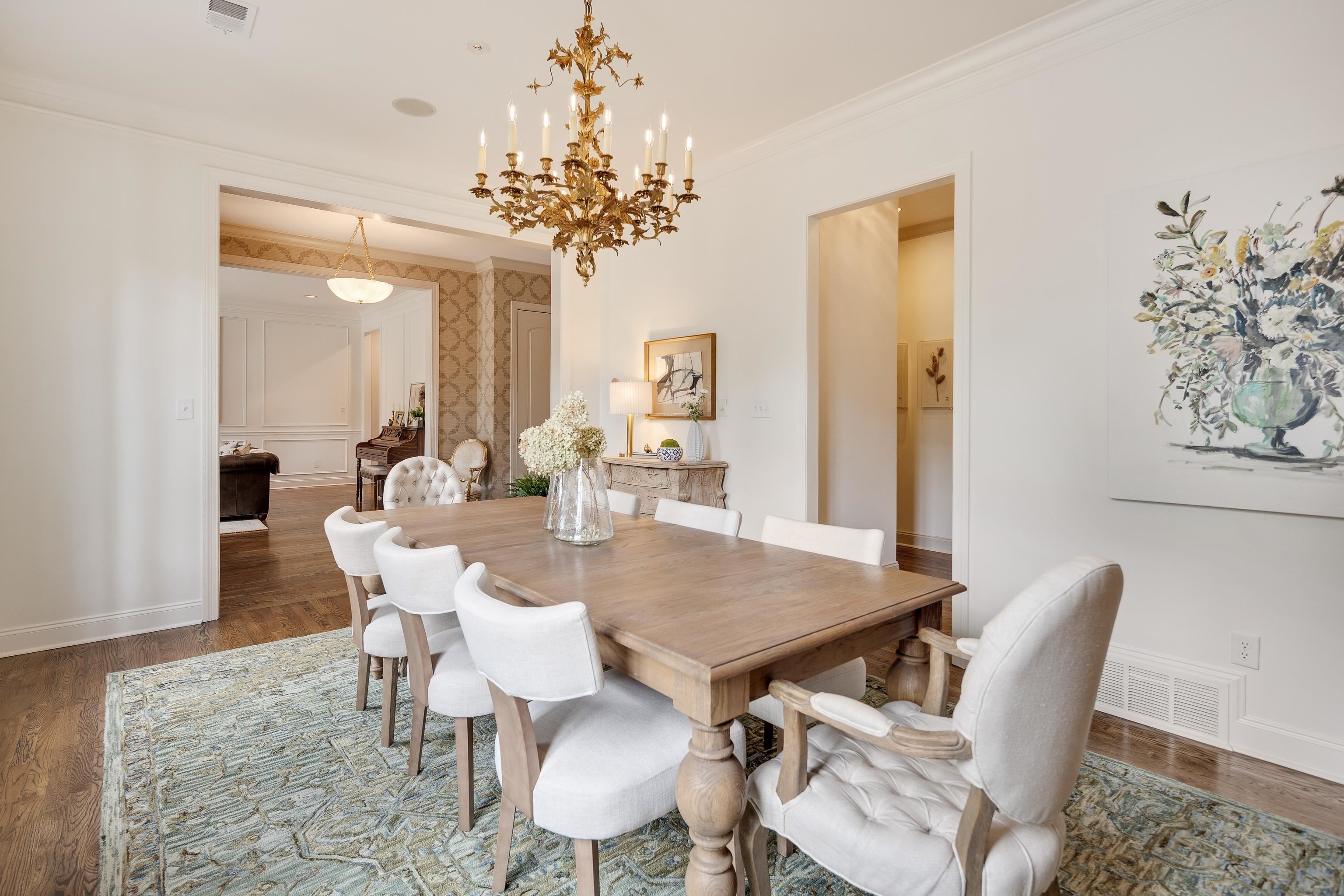 101 North Grove Park Road Memphis, TN 38117 - Photo 9 of 40 Dining space featuring wood finished floors, ornamental molding, and hanging lights