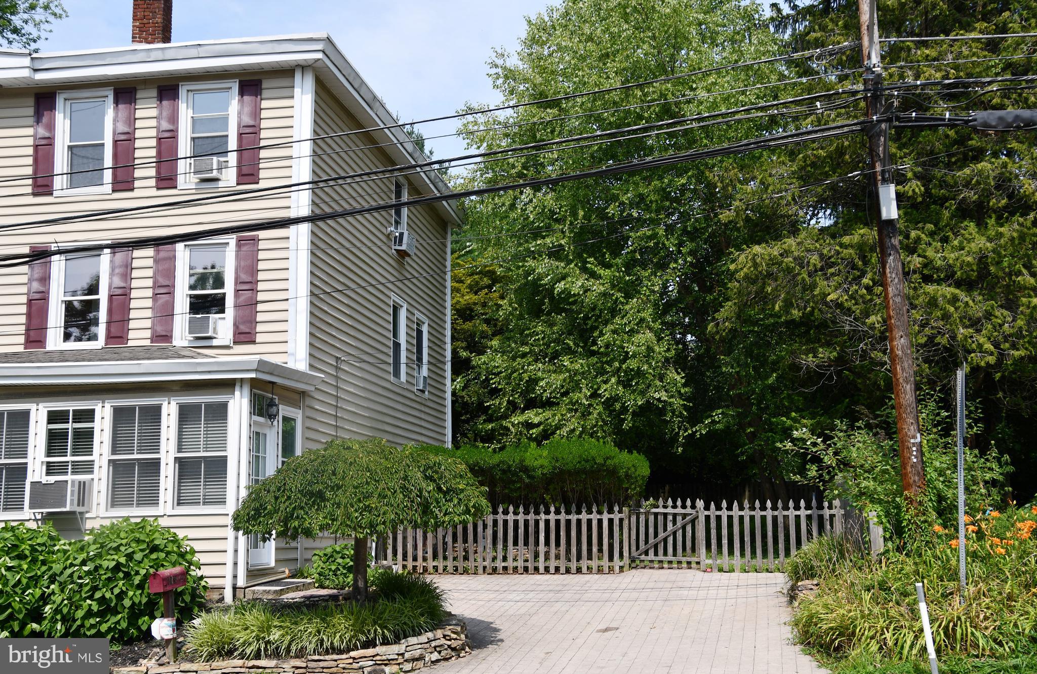 113 Brookhaven Road Wallingford, PA 19086 - Photo 2 of 43 Front showing driveway with pavers