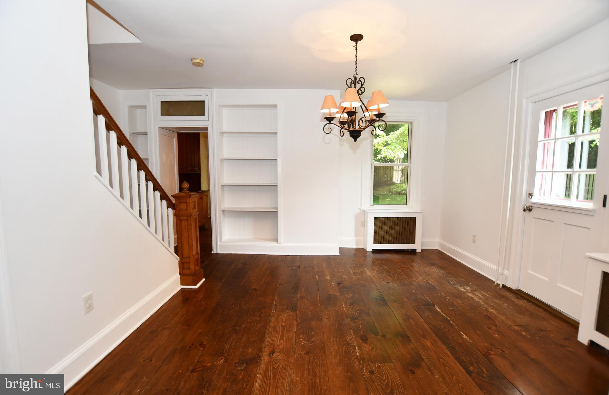 113 Brookhaven Road Wallingford, PA 19086 - Photo 9 of 43 Dining room with hardwood floors and built-ins