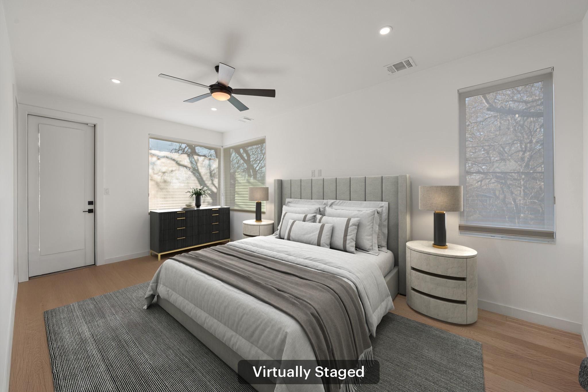 910 Nalide Street, Unit B Austin, TX 78745 - Photo 21 of 38 a bedroom with a bed and a night stand