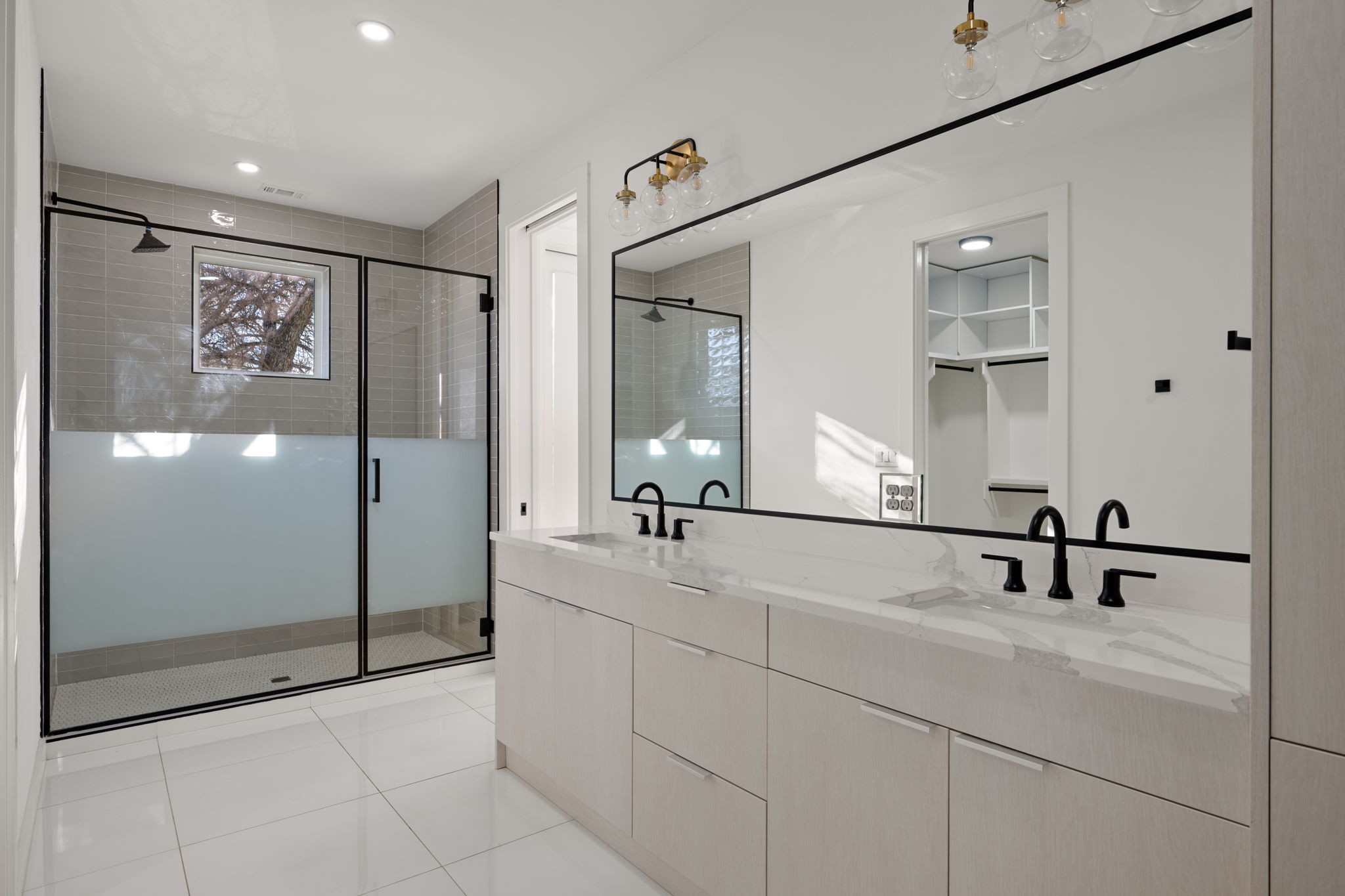 910 Nalide Street, Unit B Austin, TX 78745 - Photo 23 of 38 a bathroom with a sink and a mirror