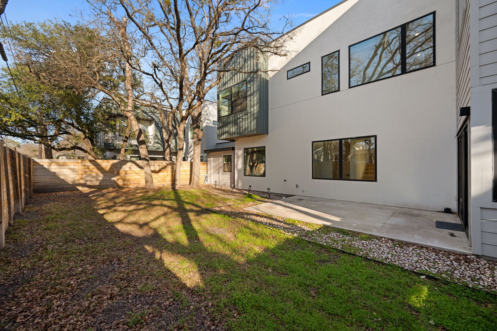 910 Nalide Street, Unit B Austin, TX 78745 - Photo 33 of 38 a view of a house with a yard