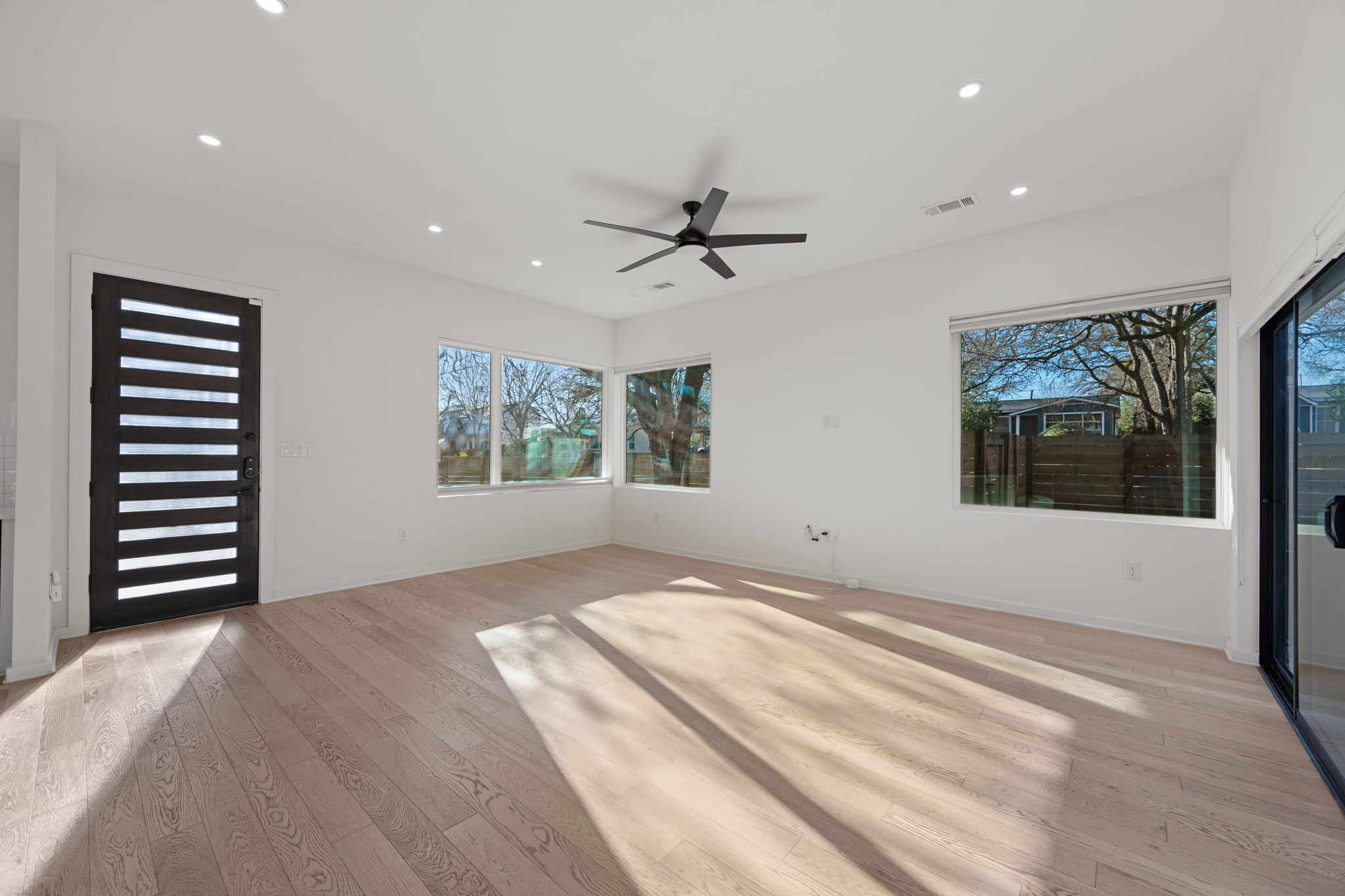 910 Nalide Street, Unit B Austin, TX 78745 - Photo 4 of 38 a view of an empty room with a window
