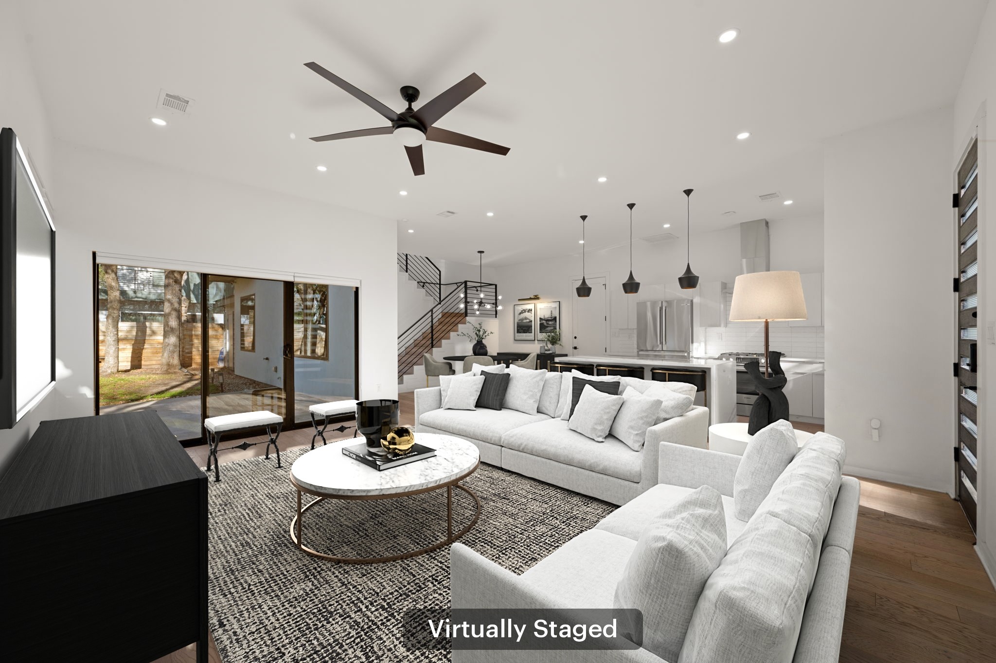 910 Nalide Street, Unit B Austin, TX 78745 - Photo 5 of 38 a living room with furniture and a large window