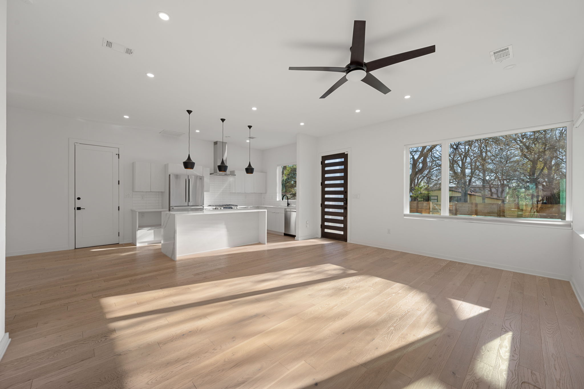 910 Nalide Street, Unit B Austin, TX 78745 - Photo 7 of 38 a view of an empty room with a window