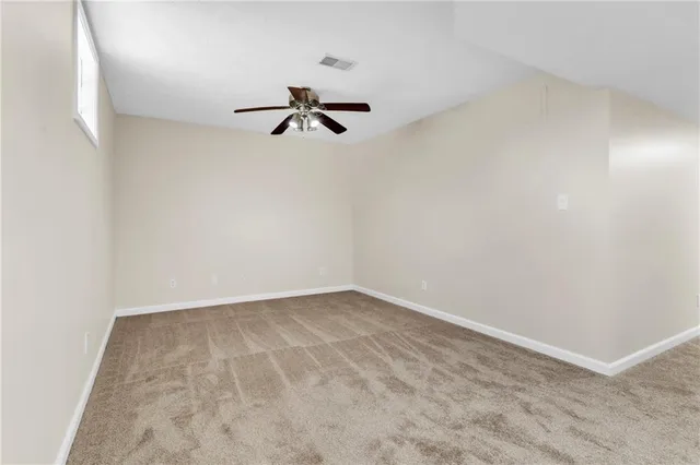 a view of a room with a hallway