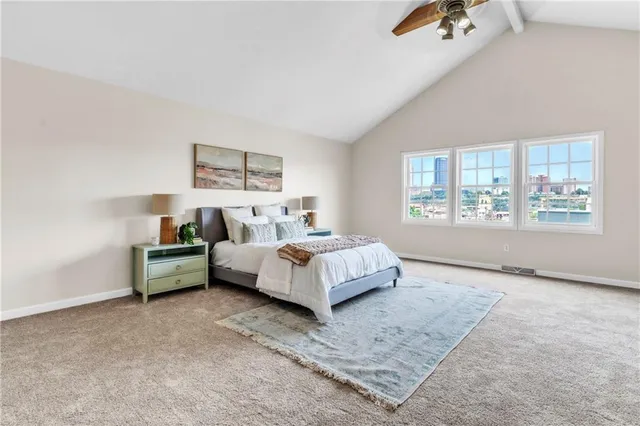 a bed room with a bed and a couch