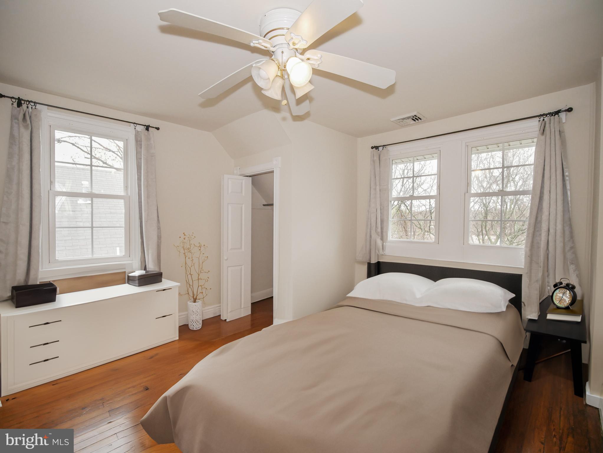 332 Crown Point Road Thorofare, NJ 08086 - Photo 28 of 36 a bedroom with a large bed and a window