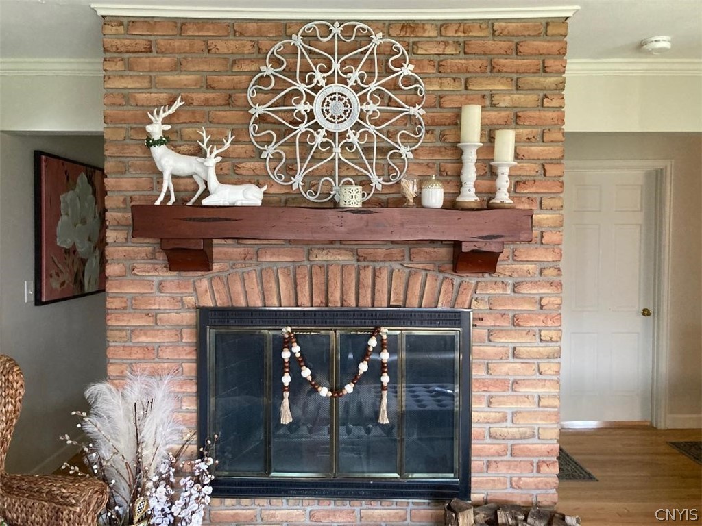 2886 West Lake Road Skaneateles, NY 13152 - Photo 11 of 28 This wood-burning fireplace is the center of atten