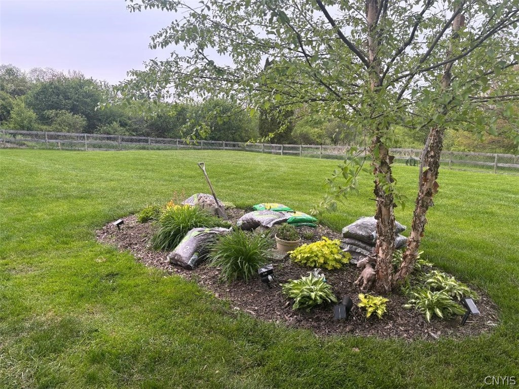 2886 West Lake Road Skaneateles, NY 13152 - Photo 22 of 28 Summertime! One of many little gardens on the 3/4