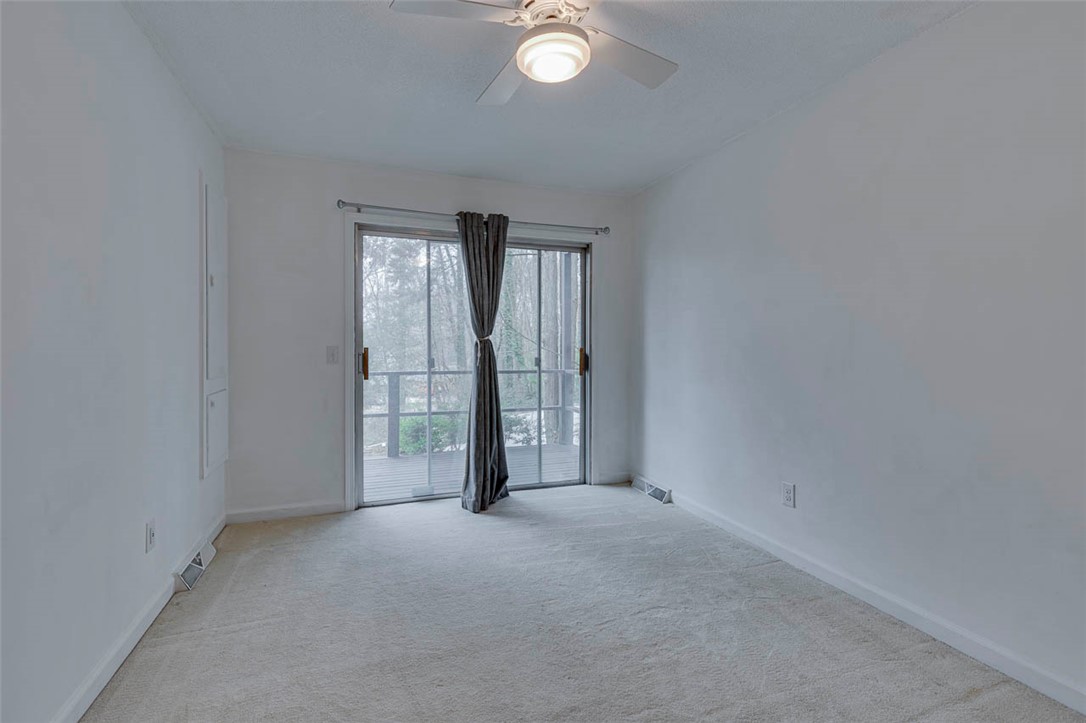 200 Valley View Drive Clemson, SC 29631 - Photo 14 of 31 This tranquil room offers direct outdoor access to a private deck, ideal for relaxation.