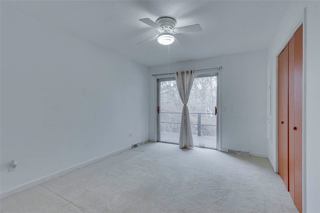 200 Valley View Drive Clemson, SC 29631 - Photo 15 of 31 This spacious bedroom offers ample natural light and a private balcony for serene outdoor access.