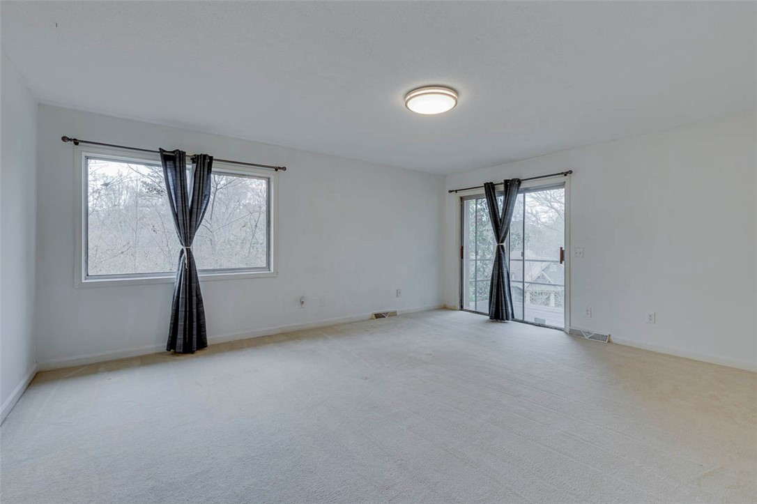 200 Valley View Drive Clemson, SC 29631 - Photo 16 of 31 This spacious room features ample natural light and a seamless connection to outdoor living.