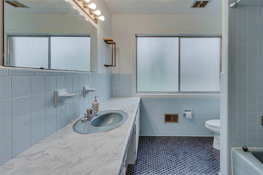 200 Valley View Drive Clemson, SC 29631 - Photo 20 of 31 This bathroom offers timeless charm with its classic tile work and practical design.
