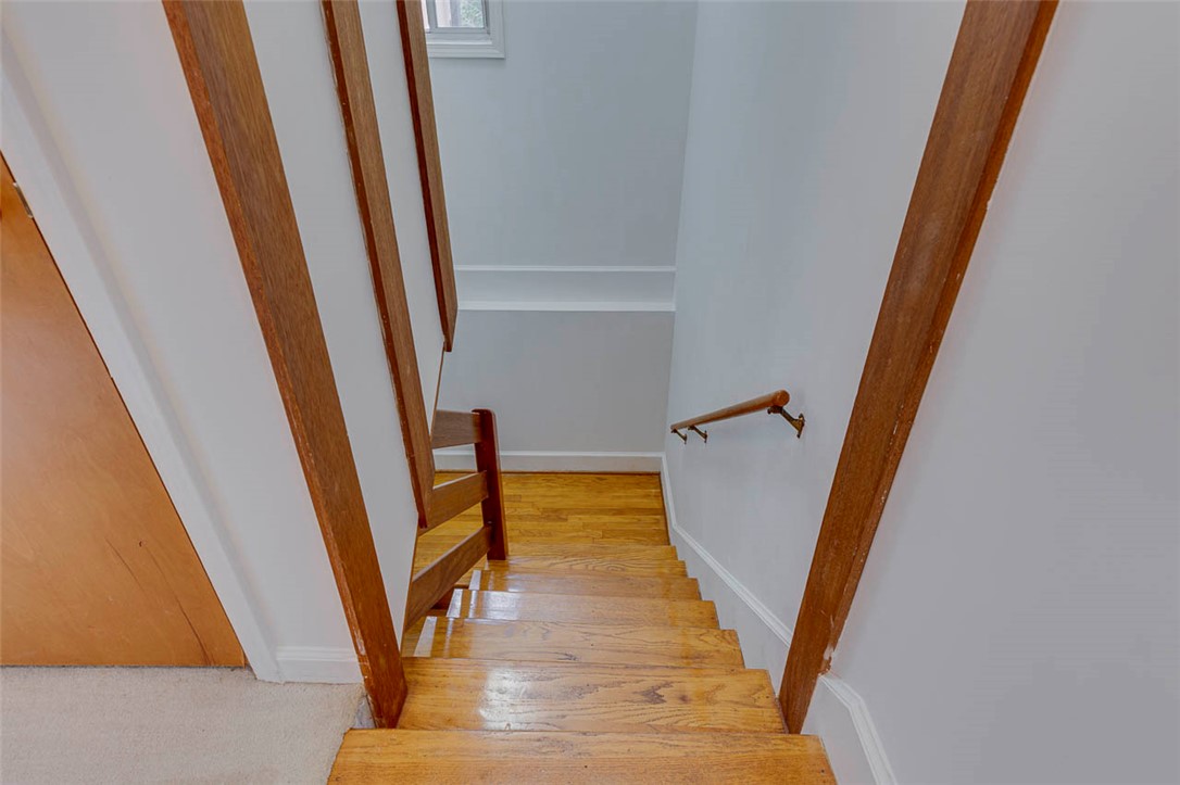 200 Valley View Drive Clemson, SC 29631 - Photo 21 of 31 This charming split-level staircase features gleaming wood steps and elegant handrails.