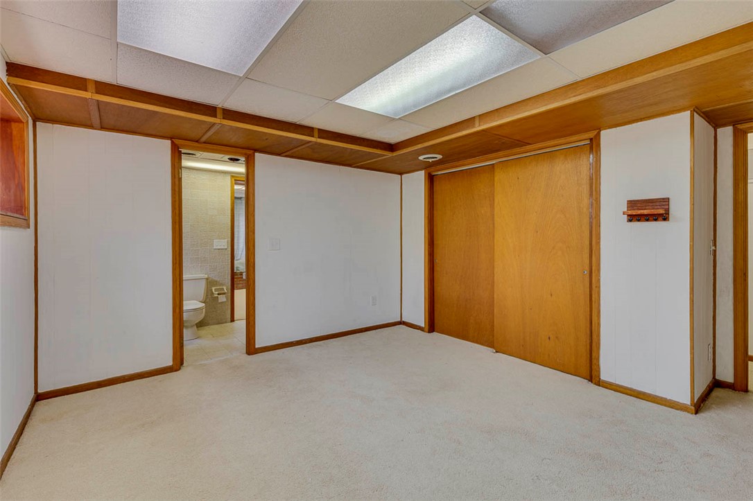 200 Valley View Drive Clemson, SC 29631 - Photo 23 of 31 This spacious room features cozy carpeting and convenient access to a bathroom.