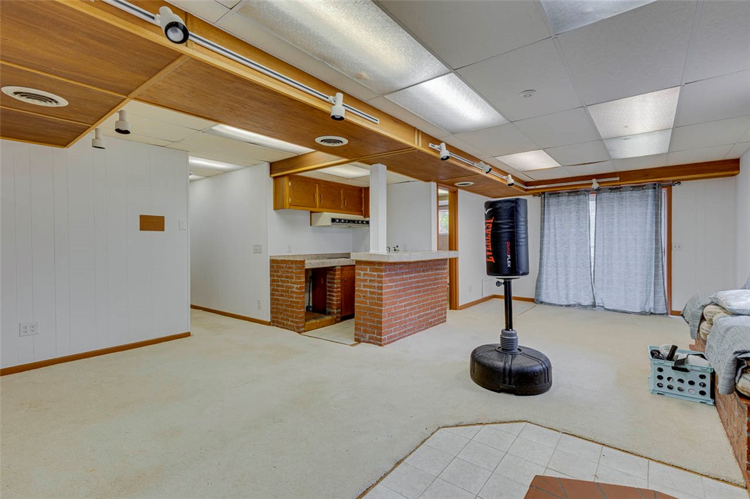 200 Valley View Drive Clemson, SC 29631 - Photo 25 of 31 This versatile basement features a functional kitchen and ample space for recreation and relaxation.