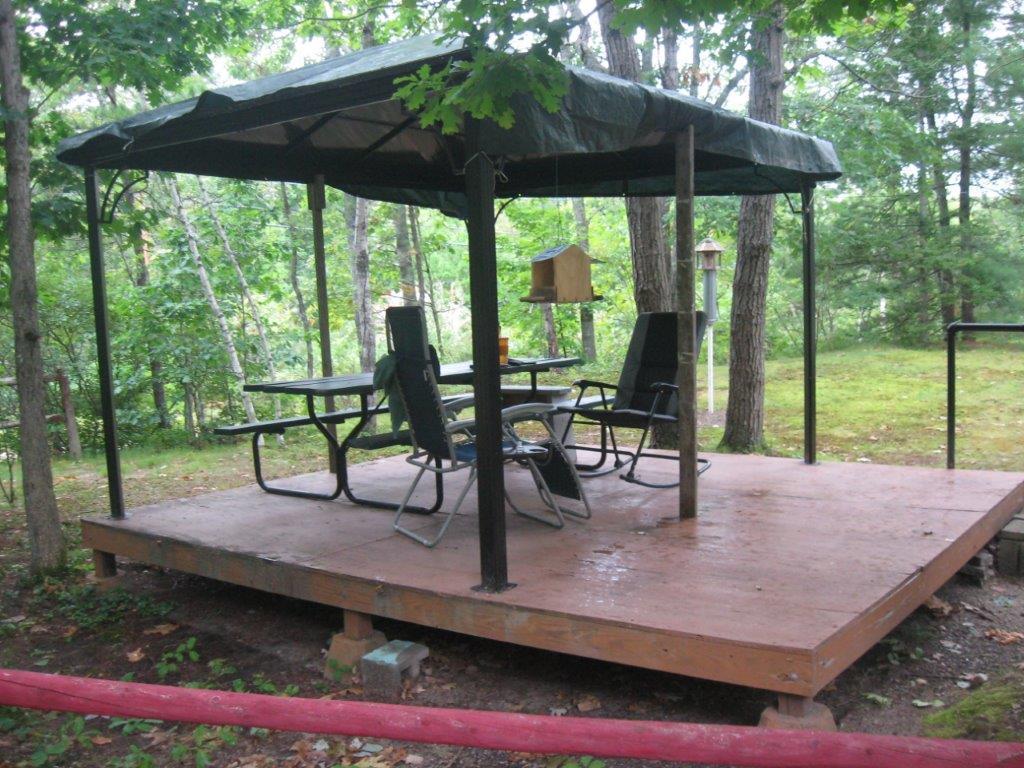 177 North Shore Road Newfield, ME 04095 - Photo 15 of 46 15. Chander - Covered Sitting Area