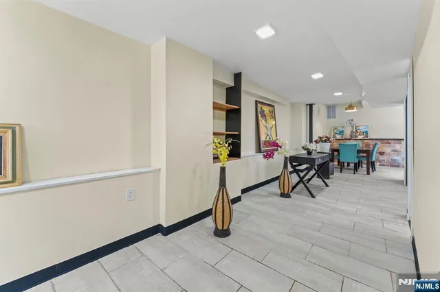 a view of a livingroom with table and chair