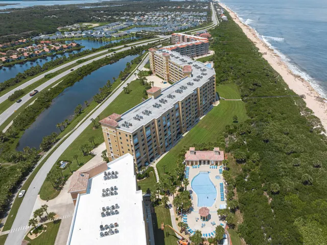 a view of balcony with furniture