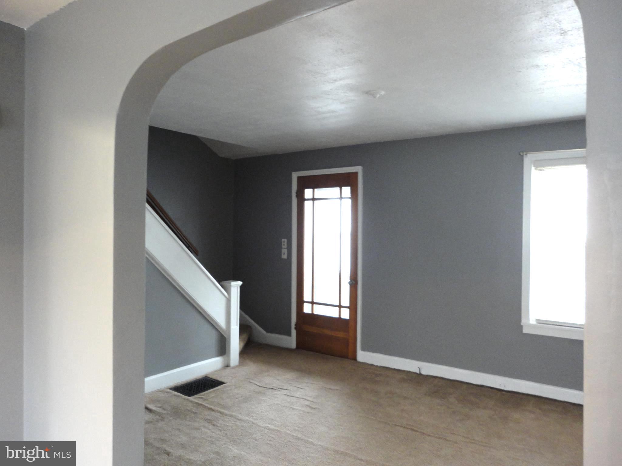 56 Kinship Road Baltimore, MD 21222 - Photo 8 of 26 View through arch into Living Room