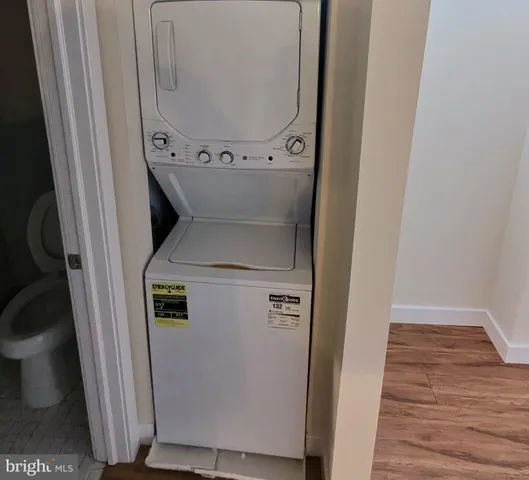 a view of room with wooden floor