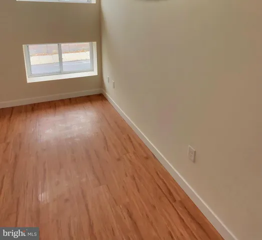 a kitchen with granite countertop a stove a sink and a microwave